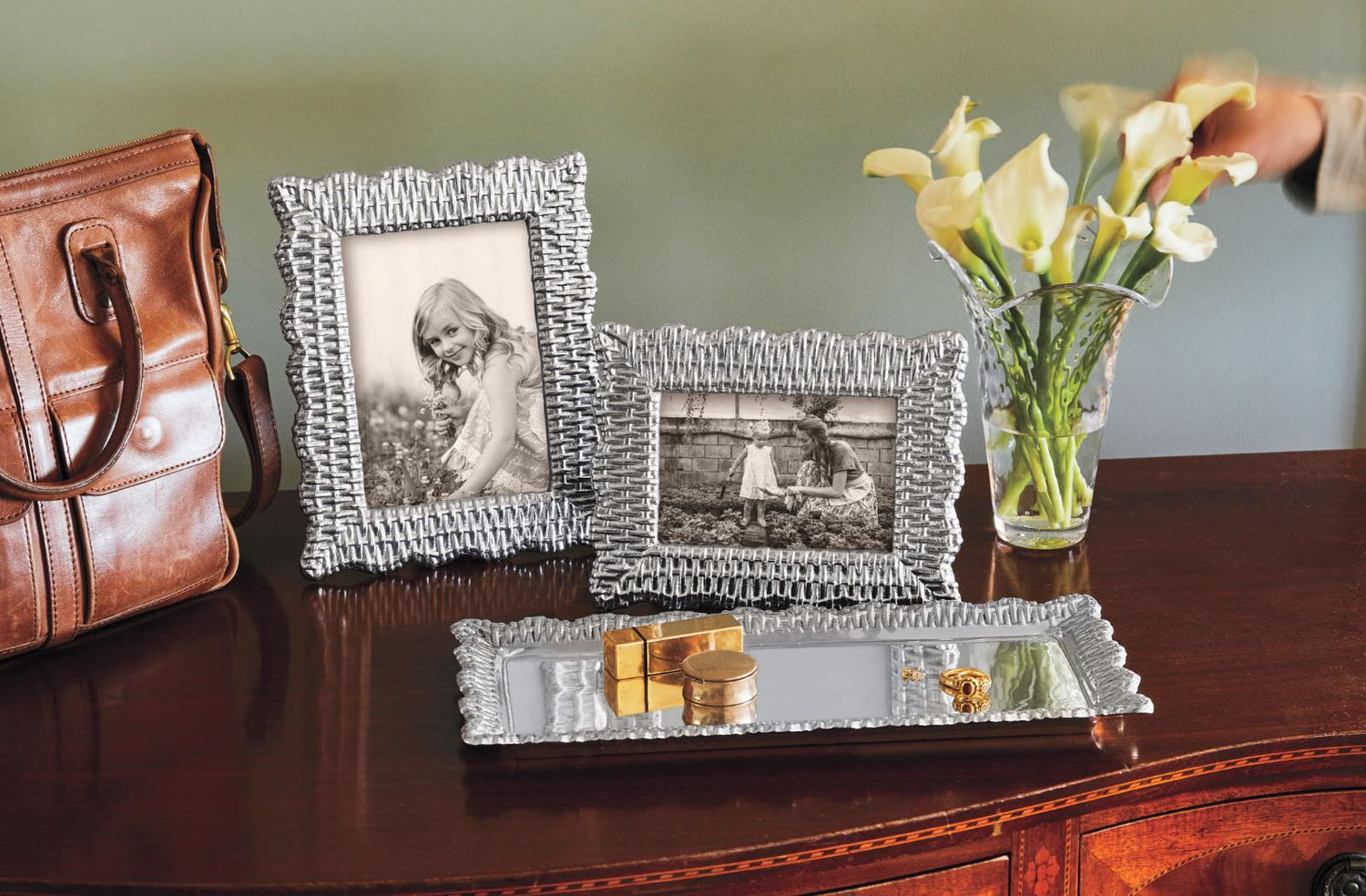 silver picture frames and jewelry trays
