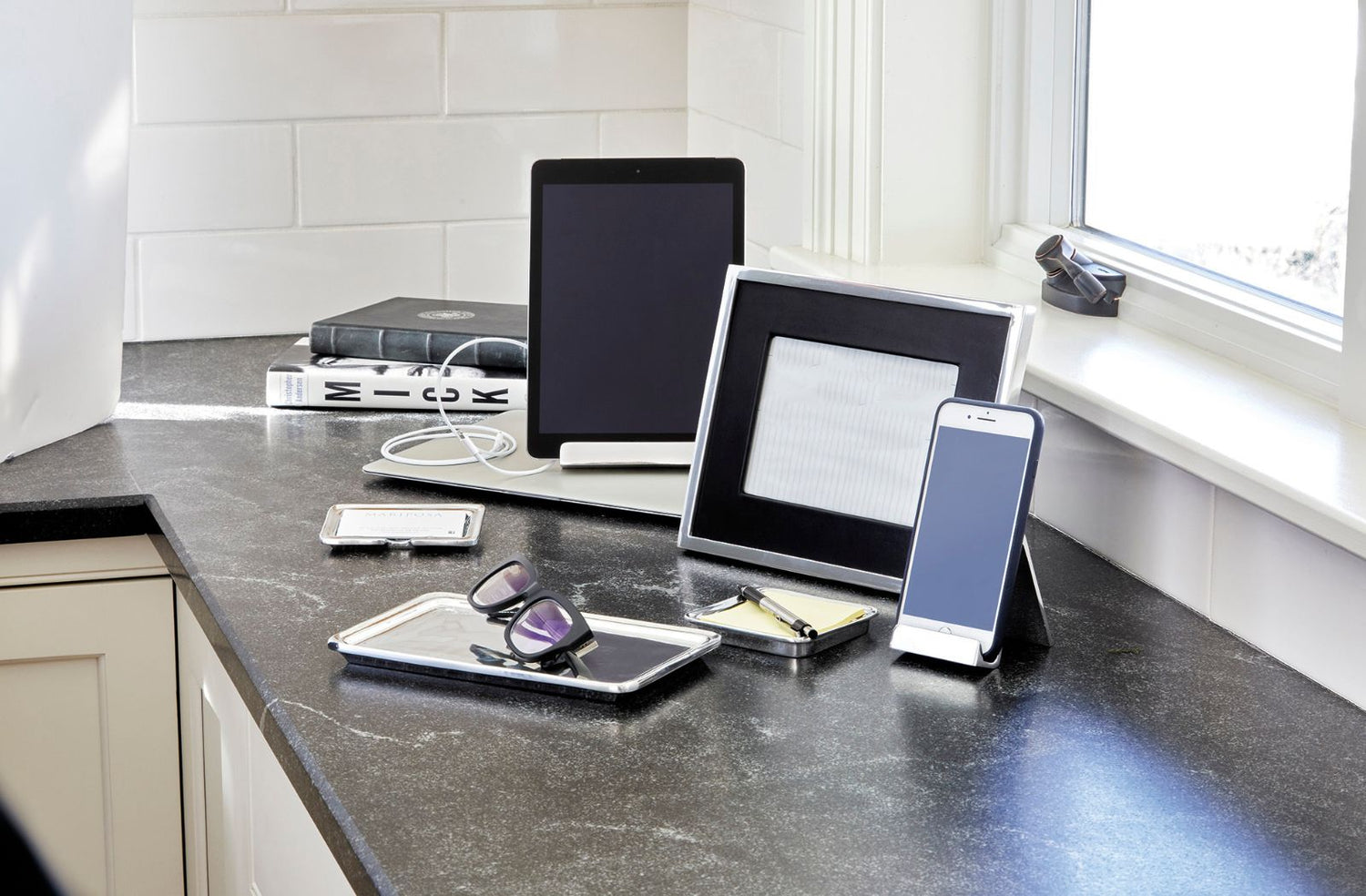 office accessories - ipad, ipad holder, silver picture frame, glasses, silver trays