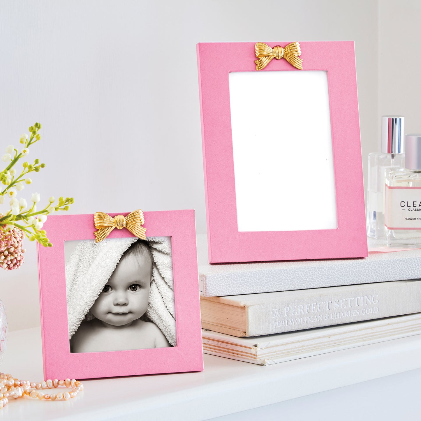 pink frames with gold bows